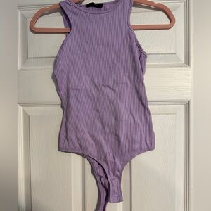 Purple body suit!